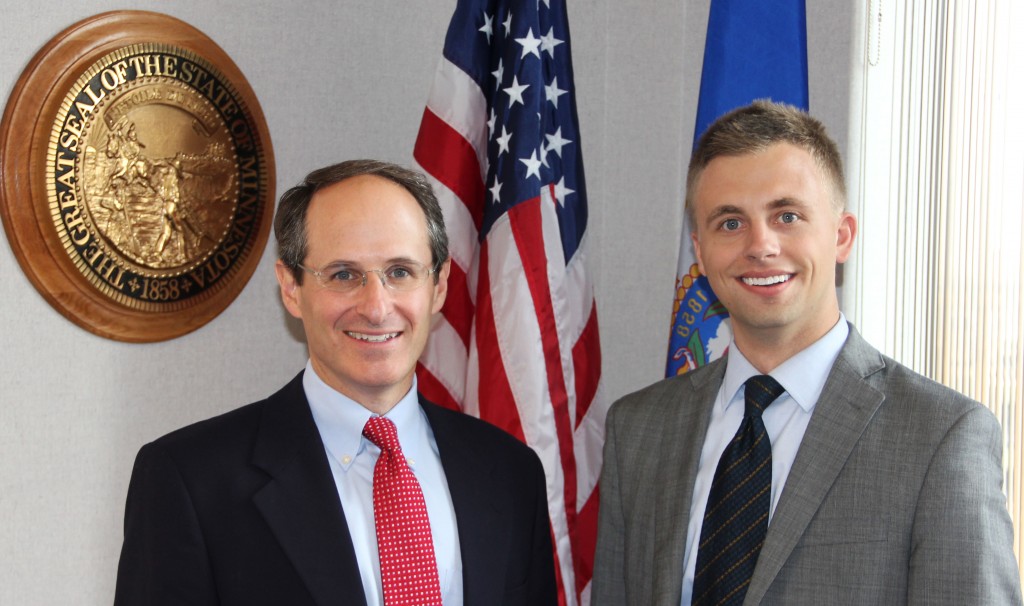 Swenson and the Commissioner of the Minnesota Department of Commerce Mike Rothman.